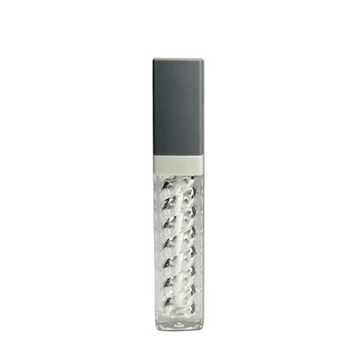 Il tubo di rossetto di plastica ruota e si ritira in vari colori.