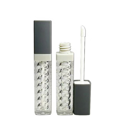 Il tubo di rossetto di plastica ruota e si ritira in vari colori.