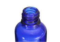 Bottiglie di olio essenziale vuote blu da 30 ml con l'imballaggio conveniente del contagoccia di vetro
