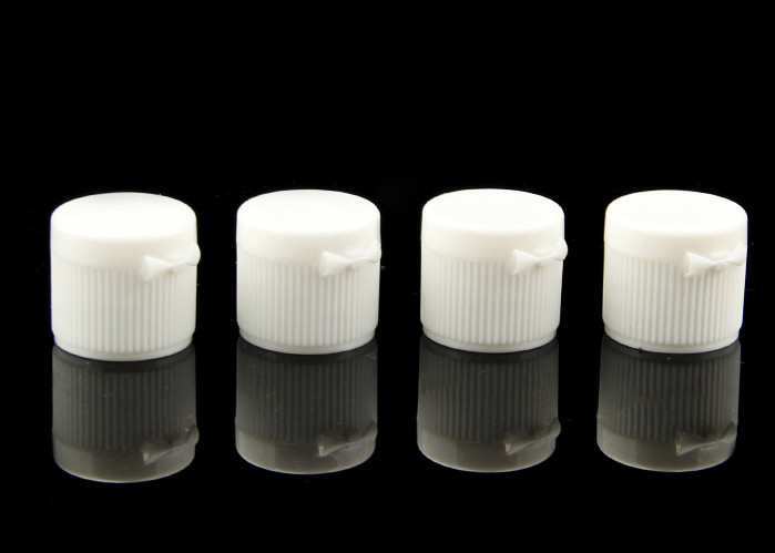superficie costolata bianca del cappuccio cosmetico di plastica 20mm dei tappi di bottiglia di 18mm su misura